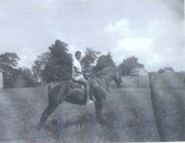 Arthur Edwards' mother on horseback